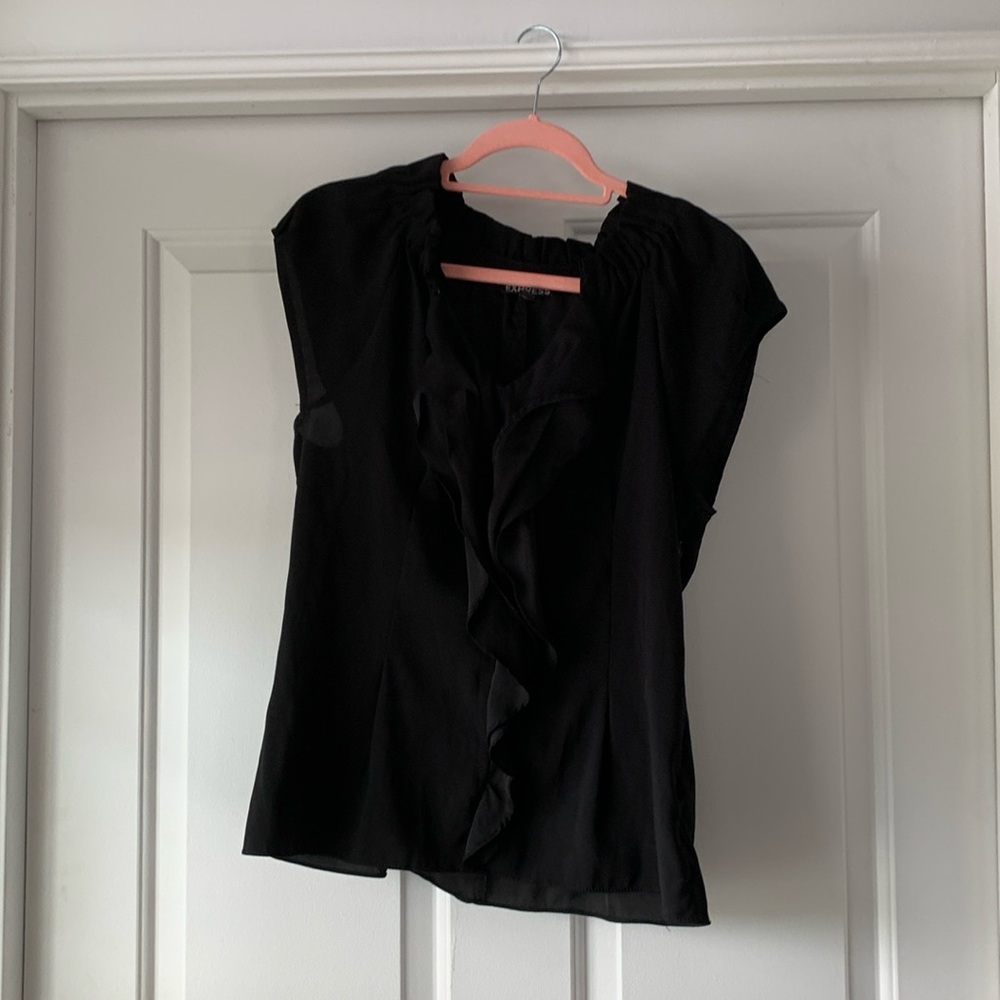 Express shirt with ruffle detail gently used